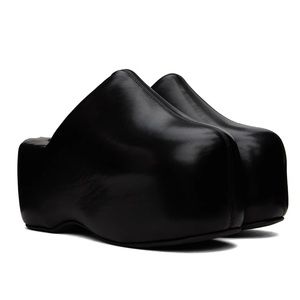 SIMON MILLER
Black Platform Bubble Clogs